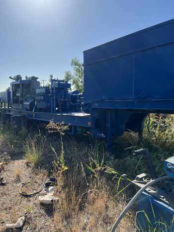 Step deck tandem axle cement pump trailer